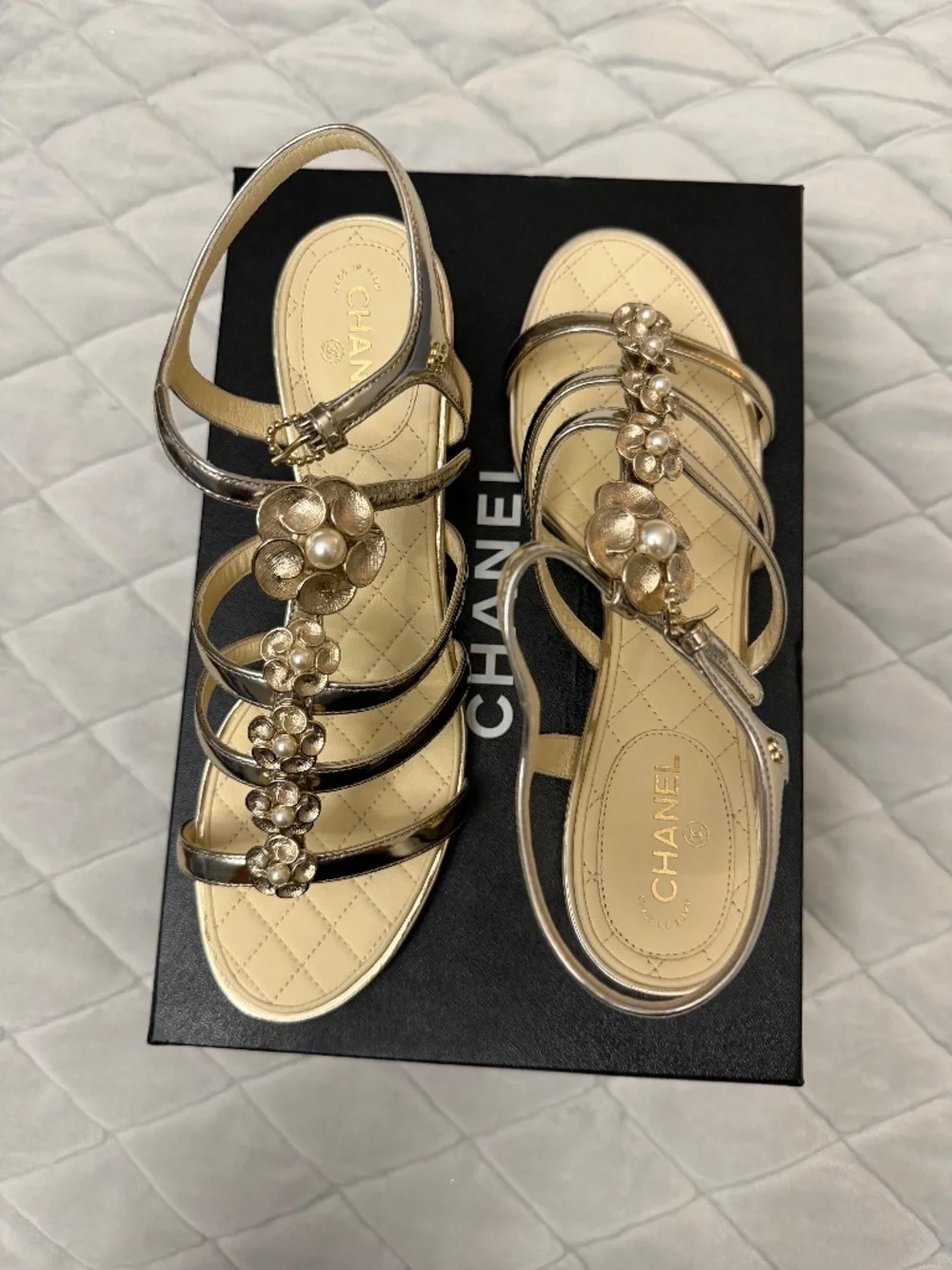 Chanel gold sandal with pearl flower detail